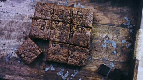 Fresh Brownies Cut on a Wooden Tray