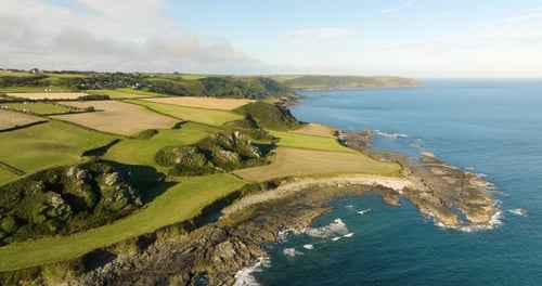 Scenic Aerial View of Coastline and Rural Landscape