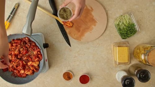 Overhead Cooking: Adding Greens to Red Sauce Dish