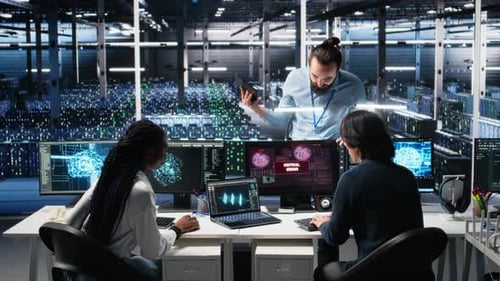 Data Center Manager Coordinates Programmers Fixing Critical Error While Using AI