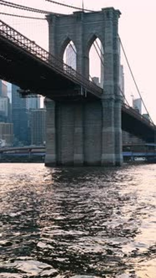 Approaching the support of the Brooklyn Bridge by the boat.