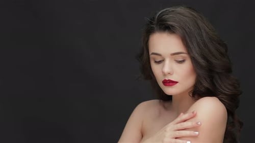 Attractive Young Woman with Bare Shoulders
