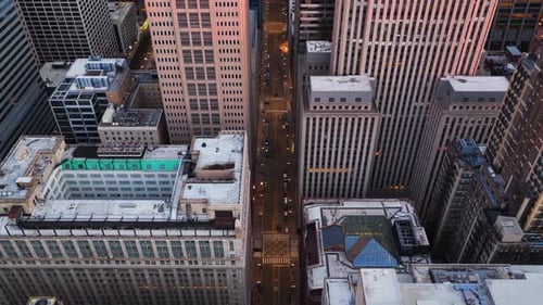Aerial view along Lasalle Street looking down between Chicago High-Rise