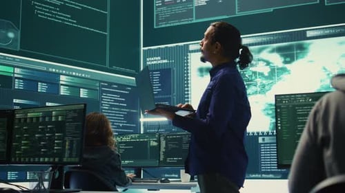 Team Analyzes Complex Code in a Tech Office