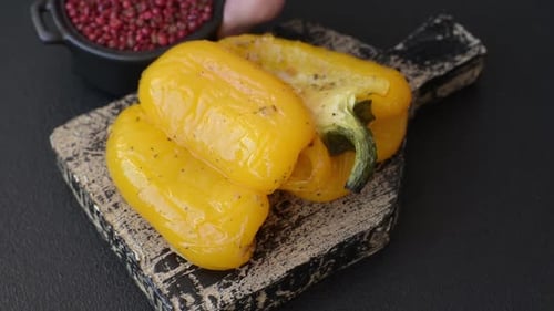 Halved Yellow Bell Pepper on Cutting Board