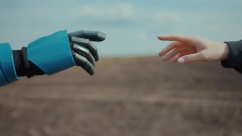 Human Hand Touching Robotic Hand in Field