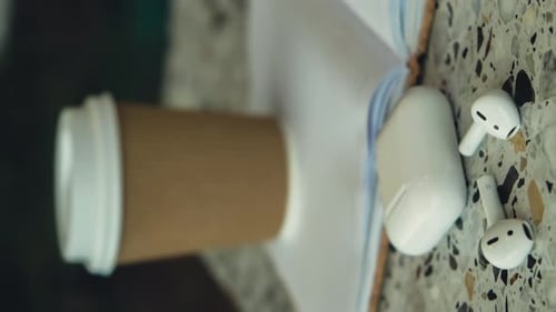 Vertical Zoom in Out Take Away Coffee in Craft Recycling Paper Cup with Paper Notebook with Wireless