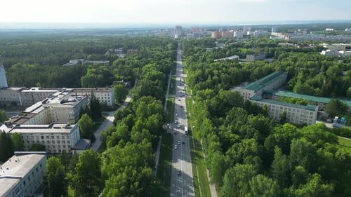 Summer Urban Landscape of Town Akademgorodok Aerial Shot of Transport Traffic on the Road in a Small