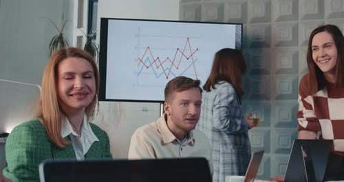 TEAMWORK CONCEPT Group of Young Happy Business People Smile Working Together at Light Modern Office