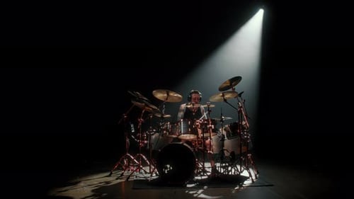 Rehearsing of Rock Band in Garage Male Musician Playing Drum Kit in Darkness Man Preparing to