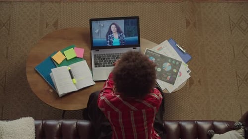 Top View of African American Female Student Learning Online Distant Course