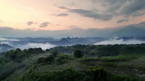 Aerial View of Mountains with Fog at Sunrise