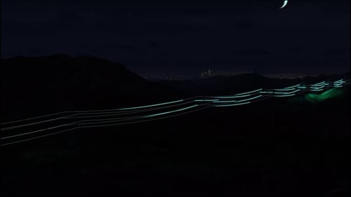 Electric Energy Flowing Through Power Grid Wires at Night