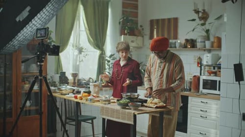 People Preparing Food Together in Kitchen