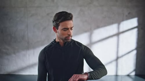 Sportsman Looking Smartwatch Loft Room Closeup Guy Athlete Tracking Result