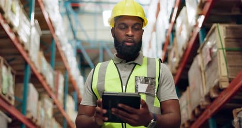 Walking, warehouse and black man with tablet for inspection, inventory and online stock