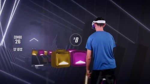 Young Adult Plays Virtual Reality Rhythm Game