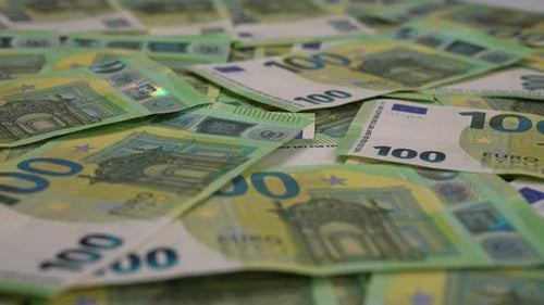 Pile of One Hundred Euro Bank Notes