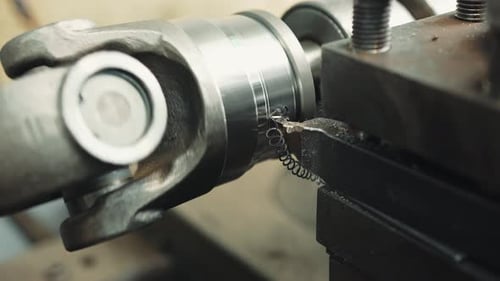 Process of machining an automobile drive shaft propeller shaft on a lathe