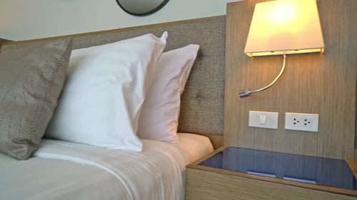 beautiful pillow on bed decoration in bedroom interior