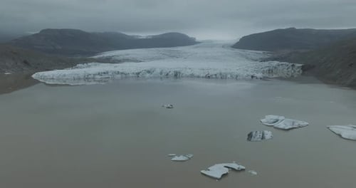 Aerial view of Hoffellsfjoll glacier and iceberg in icy terrain, Iceland.