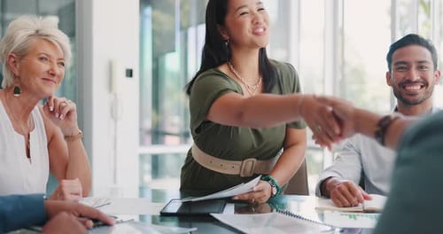 Creative asian woman, handshake and applause in meeting for deal, b2b or agreement at the office