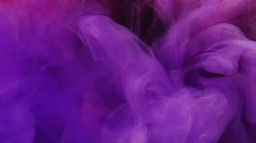 Abstract Swirling Purple Ink Background