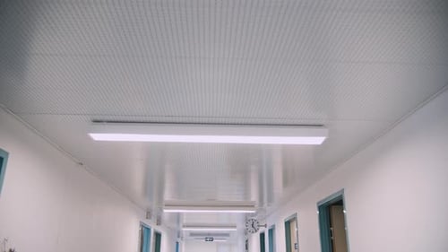 Driving on Hospital Hall with View of Lamps