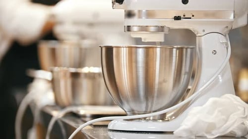 Process of Cooking Meringue Whipped Egg Whites on Mixer Whisk
