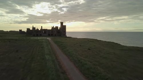 Aerial view of a Slains Castle ruin at sunrise, Aberdeenshire, Scotland