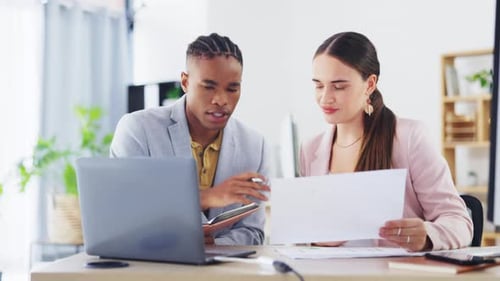 Planning, laptop and business people with documents in office for creative, meeting and review