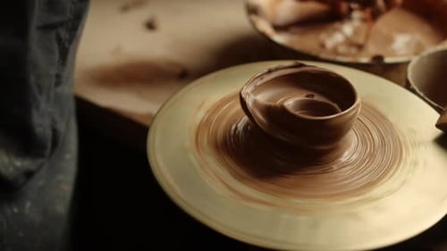 Pottery Hands Clay Shaping in Studio