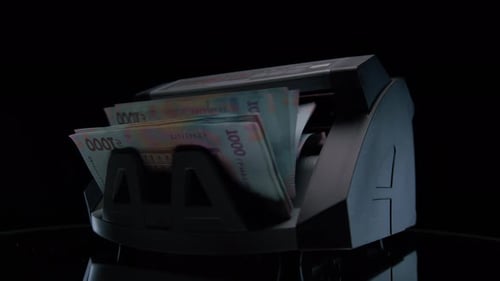 Cash Machine Counting 1000 Hryvnia Notes