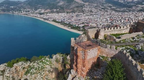 Aerial Video Alanya Fortress with a View of the Mediterranean Sea and the City s RedRoofed Houses