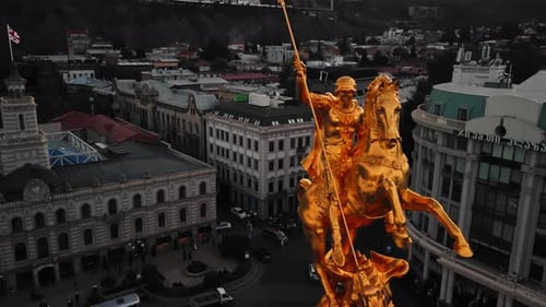 Closeup Aerial Footage of Saint George Monument in Form of Golden Equestrian Located