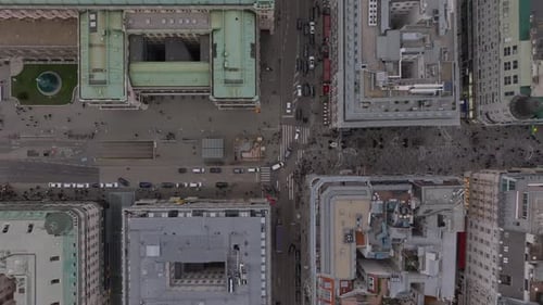 Top Down Panning Footage of Streets and Blocks of Houses in Old Town Cars and Pedestrians in Streets