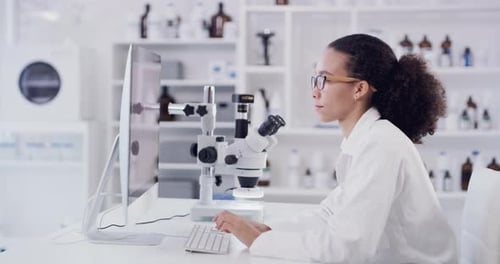 Woman Scientist Working in Bright Medical Laboratory