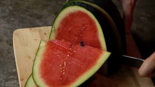 Female Hands Cutting Watermelon, Super 240