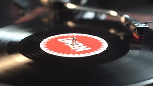 New Music Compilation Vinyl Record From 1980's, Spinning and Playback, Close Up