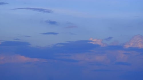 Pink and Blue Clouds Drifting in the Sky