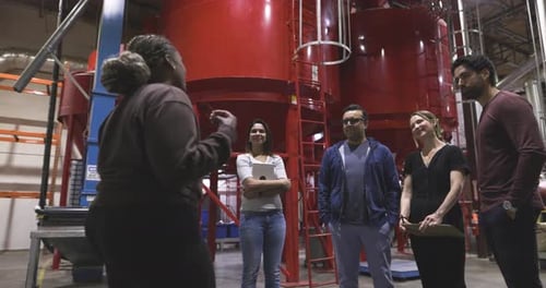 Smiling Workers Listening to Supervisor in Coffee Roasting Plant 10 Seconds or Greater