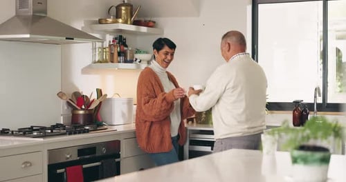 Loving Couple Sharing a Moment in Kitchen