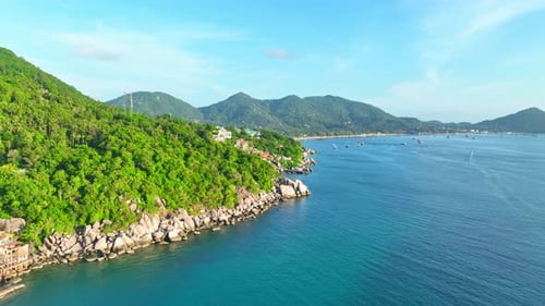 Drone aerial view captures stunning island. 4K.