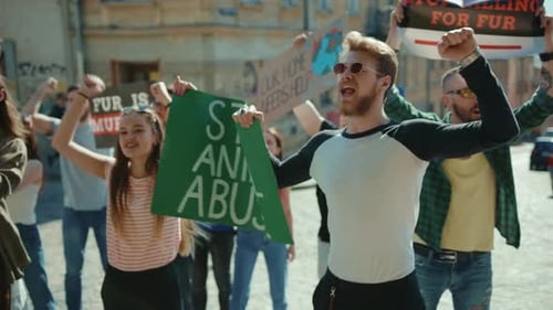 Group of Adults Marching in a Street Protest