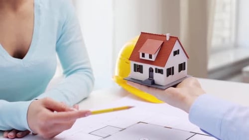 Real estate deal house model and blueprint discussion