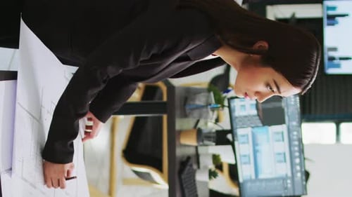 Vertical Video Architects Team Studying 3d Printed Building Model in Office