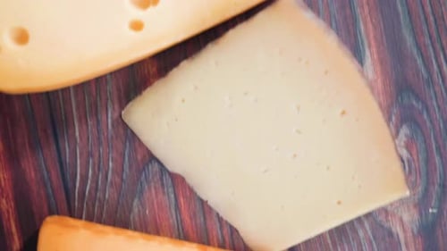 Cheese Varieties on Wooden Cutting Board