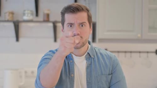 Man Gesturing and Making Facial Expressions