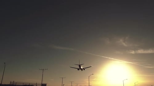 Jet airliner landing on runway.