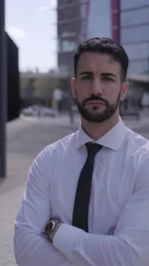 Attractive Young Confident Business Man Posing Serious Outside Office Building